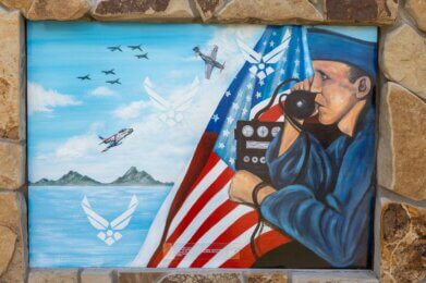 a mural of US Air Force AFC John Rybarczyk on display at Amherst Patriots Park